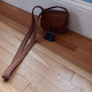 Chic Brown Crossbody Bag with Tassel Accent